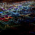 Energetic lines glowing in dark space